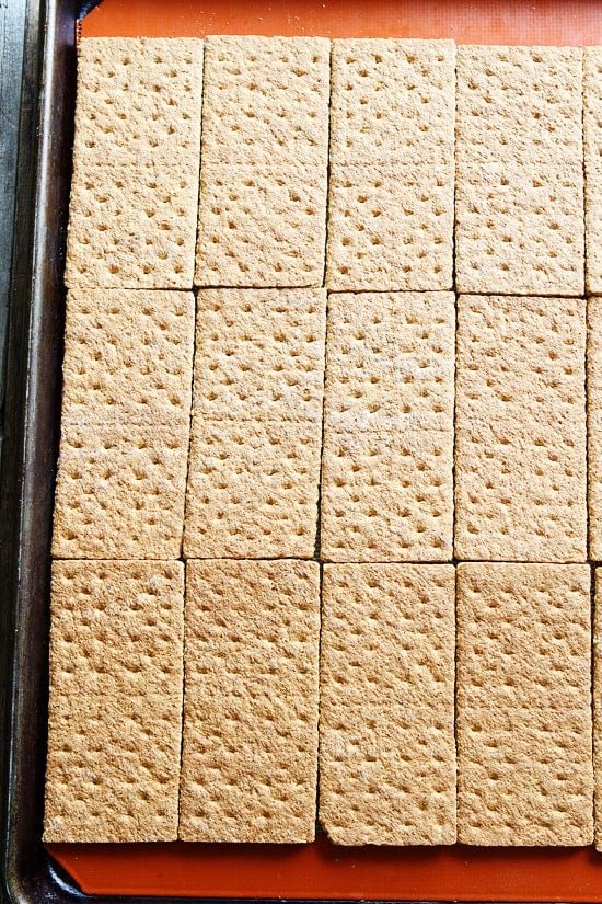 Easy Graham Cracker Toffee Recipe on twopeasandtheirpod.com This easy toffee is a holiday favorite! Easy Graham Cracker Toffee Recipe