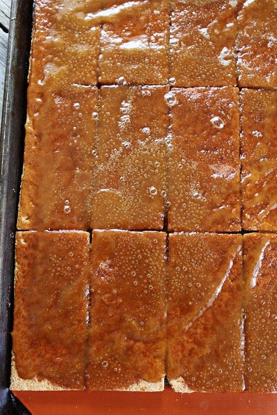 Easy Graham Cracker Toffee Recipe on twopeasandtheirpod.com You only need 5 ingredients to make this amazing toffee! Easy Graham Cracker Toffee Recipe