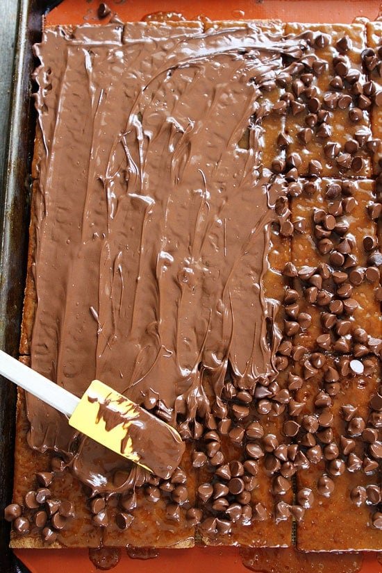 Easy Graham Cracker Toffee Recipe on twopeasandtheirpod.com You only need 5 ingredients to make this delicious toffee! It is perfect for holiday gift giving! Easy Graham Cracker Toffee Recipe