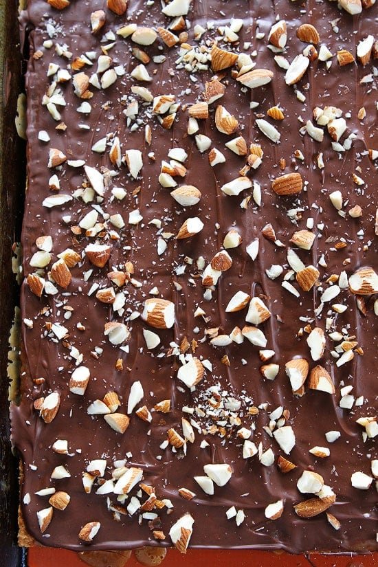 Easy Graham Cracker Toffee Recipe on twopeasandtheirpod.com You only need 5 ingredients to make this delicious toffee! It is perfect for holiday parties and gift giving! Easy Graham Cracker Toffee Recipe