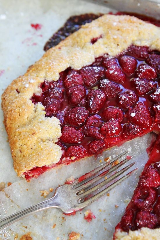 Raspberry Galette on twopeasandtheirpod.com This easy galette recipe is a family favorite and the perfect dessert for the holidays! Raspberry Galette