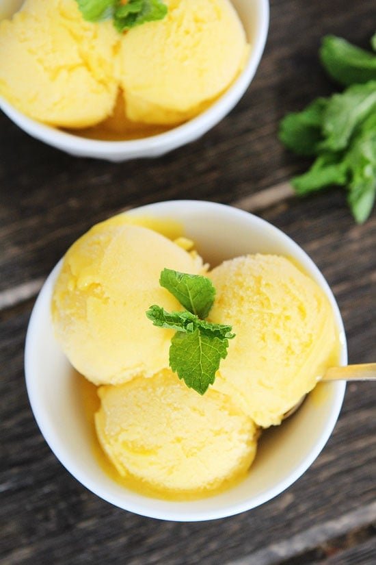 Pineapple Mango Sorbet Recipe on twopeasandtheirpod.com This sweet, creamy, and refreshing sorbet is easy to make at home! Pineapple Mango Sorbet Recipe