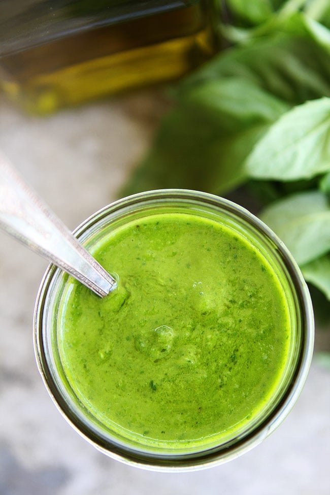 Basil Vinaigrette Recipe on twopeasandtheirpod.com This easy basil vinaigrette is great as a salad dressing or sauce for chicken, fish, vegetables, or pasta. It is the BEST! Basil Vinaigrette Recipe