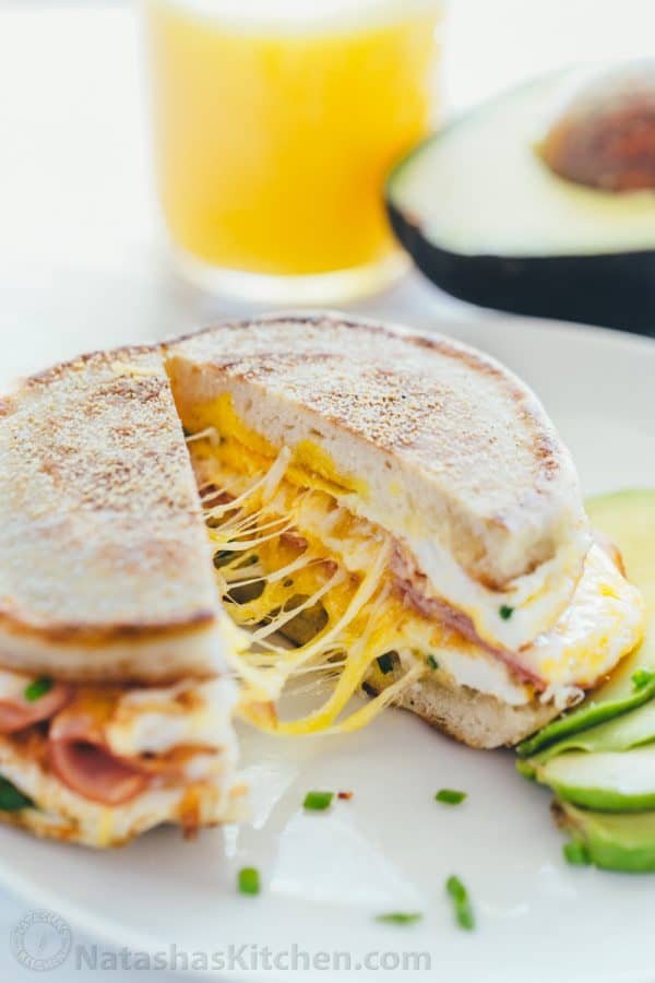 This breakfast sandwich is cheesy, juicy, easy and so delicious! All you need is 5 minutes and 5 ingredients. A one-pan breakfast sandwich recipe with video | natashaskitchen.com