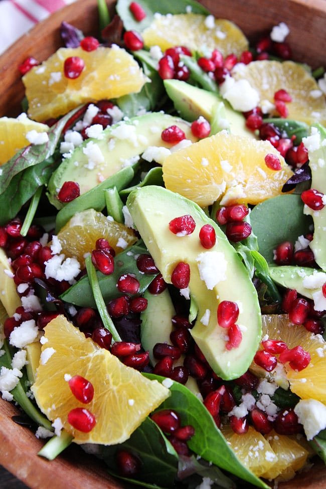 Pomegranate, Orange, and Avocado Salad Recipe on twopeasandtheirpod.com This simple salad is fresh, colorful, and so delicious! You have to try it! Pomegranate, Orange, and Avocado Salad Recipe