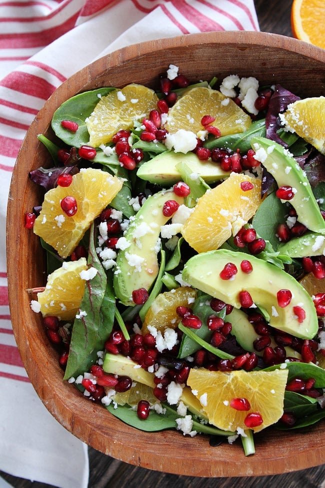 Pomegranate, Orange, and Avocado Salad Recipe on twopeasandtheirpod.com This simple and healthy salad goes great with any meal! Pomegranate, Orange, and Avocado Salad Recipe