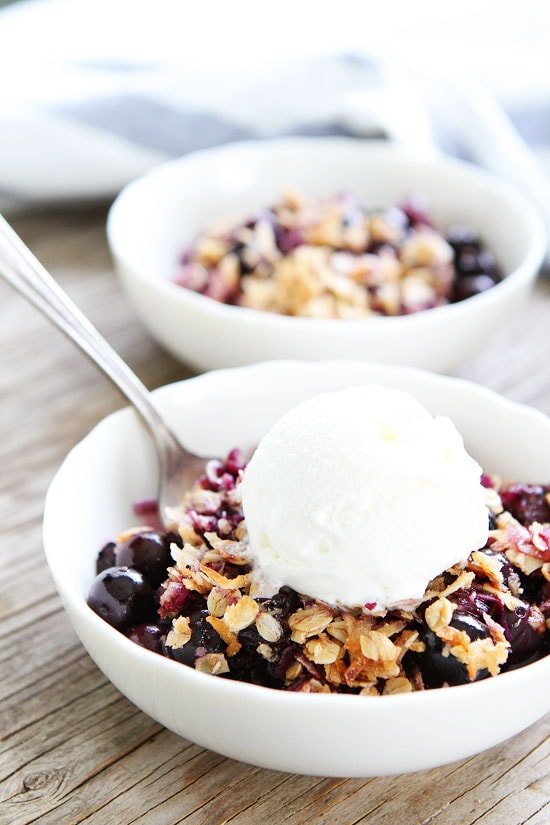 Blueberry Coconut Crisp Recipe on twopeasandtheirpod.com This easy blueberry crisp recipe is the BEST! Make it for dessert tonight! Blueberry Coconut Crisp Recipe