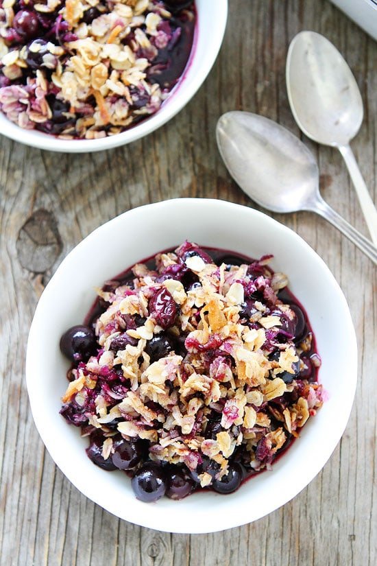 Blueberry Coconut Crisp Recipe on twopeasandtheirpod.com This blueberry crisp recipe is the BEST! It's easy to make and a real crowd pleaser! Blueberry Coconut Crisp Recipe