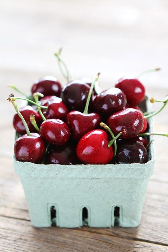 Balsamic Grilled Cherry, Blueberry, Goat Cheese, and Candied Hazelnut Salad Recipe on twopeasandtheirpod.com A great recipe for using up summer cherries! Balsamic Grilled Cherry, Blueberry, Goat Cheese, and Candied Hazelnut Salad Recipe