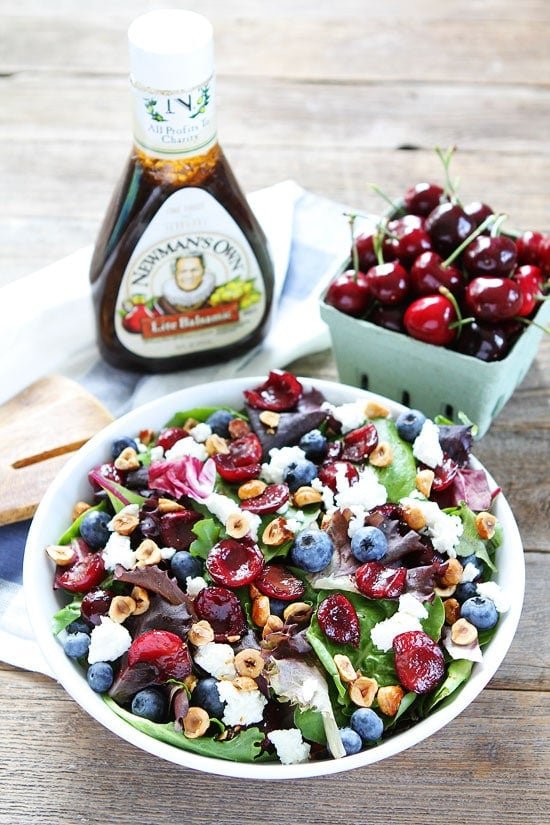 Balsamic Grilled Cherry, Blueberry, Goat Cheese, and Candied Hazelnut Salad Recipe on twopeasandtheirpod.com Make this delicious salad all summer long! Balsamic Grilled Cherry, Blueberry, Goat Cheese, and Candied Hazelnut Salad Recipe