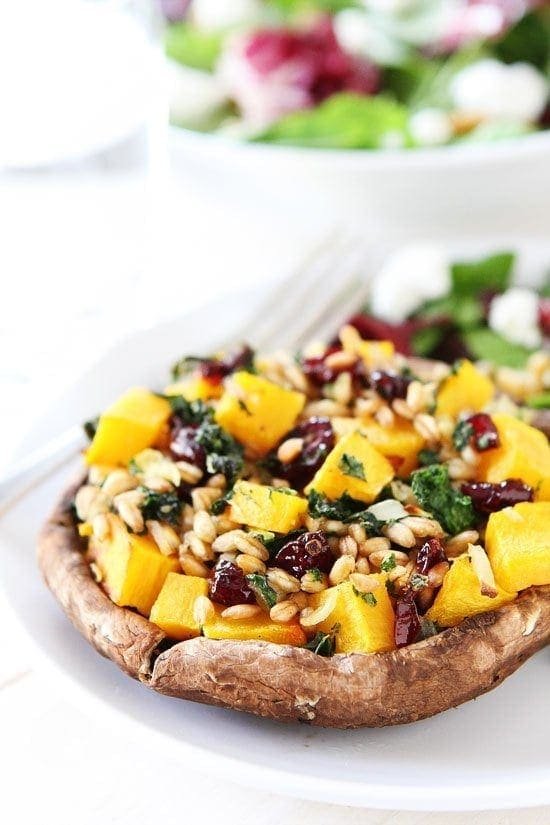 Stuffed Portobello Mushrooms with Farro, Butternut Squash, and Kale Recipe on twopeasandtheirpod.com Love this healthy meatless meal! Stuffed Portobello Mushrooms with Farro, Butternut Squash, and Kale Recipe on twopeasandtheirpod.com