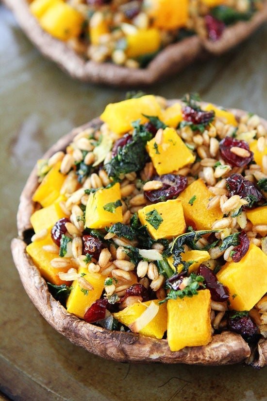 Stuffed Portobello Mushrooms with Farro, Butternut Squash, and Kale Recipe on twopeasandtheirpod.com The perfect fall meal! Stuffed Portobello Mushrooms with Farro, Butternut Squash, and Kale Recipe