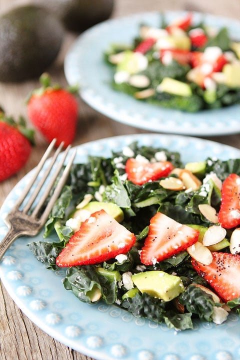 Kale, Strawberry & Avocado Salad with Lemon Poppy Seed Dressing on www.twopeasandtheirpod.com Love this healthy salad! Kale-Strawberry-Avocado-Salad-5