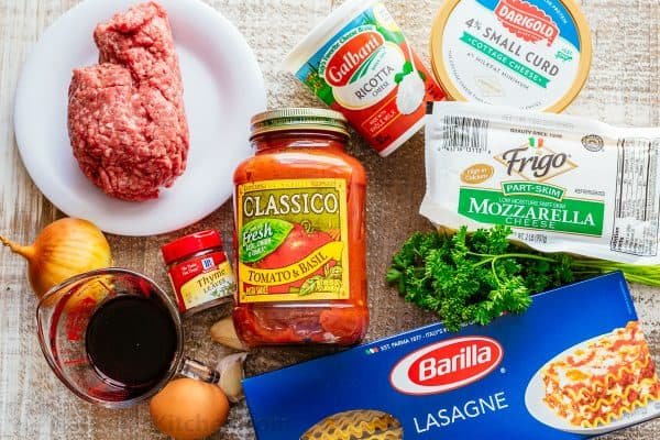 Ingredients for crockpot lasagna with beef, marinara, 3 cheeses and lasagna noodles