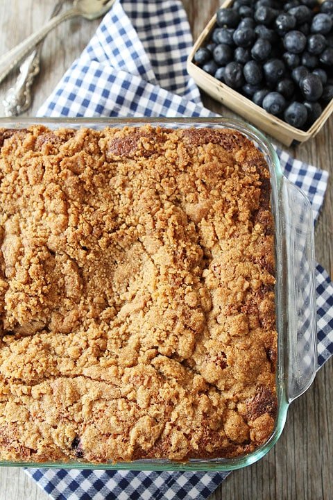 Blueberry Coffee Cake Recipe on twopeasandtheirpod.com. Love the blueberries and streusel topping! This cake is a MUST make! #cake Baked Blueberry Coffee Cake in Dish