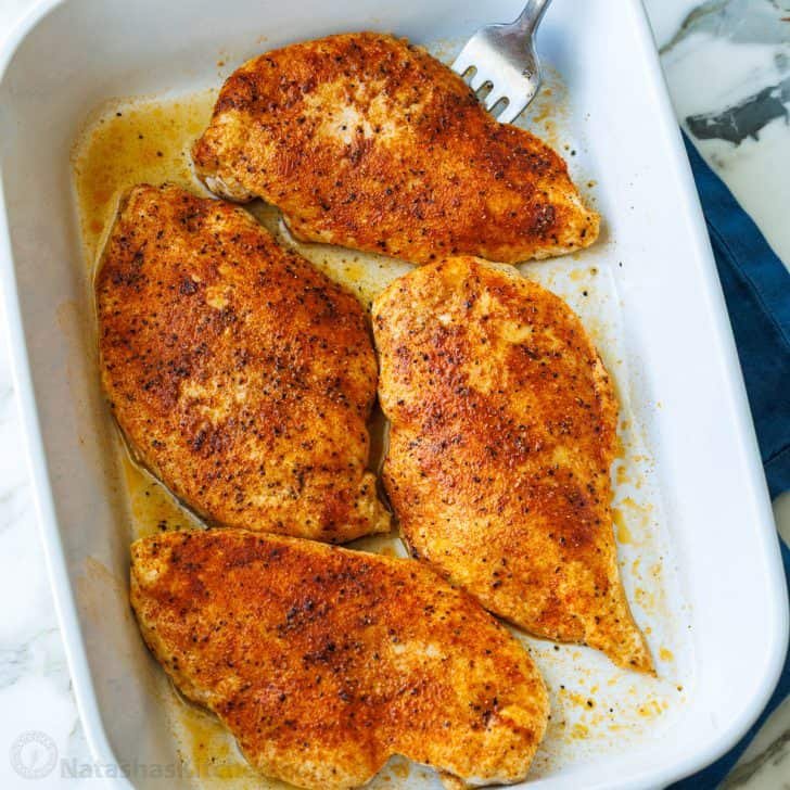Baked chicken breast served in a casserole dish