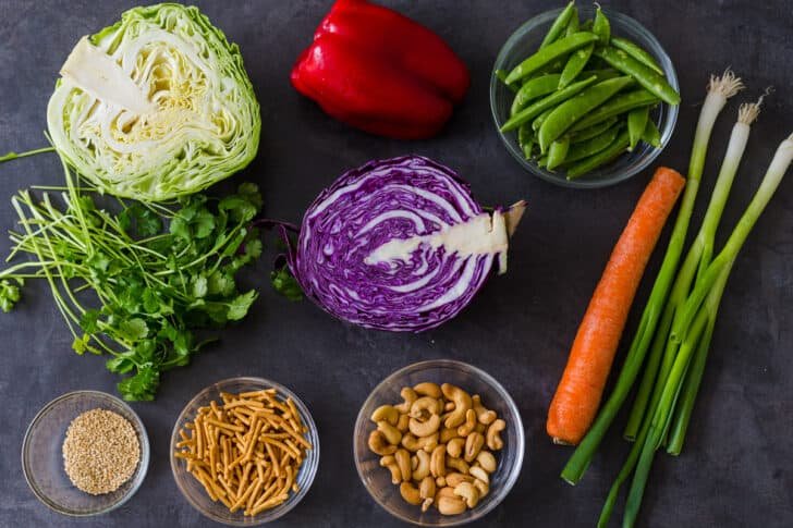 Ingredients for the Asian Chopped Salad with cabbage, bell pepper, chow mein noodles, green onion, sweet peas and carrot