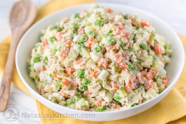 The most exciting potato salad you'll try! This chicken olivye is a favorite at church potlucks. | natashaskitchen.com 