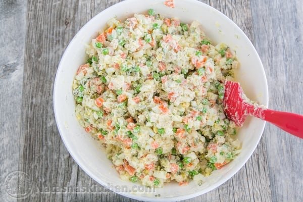 The most exciting potato salad you'll try! This chicken olivye is a favorite at church potlucks. | natashaskitchen.com 