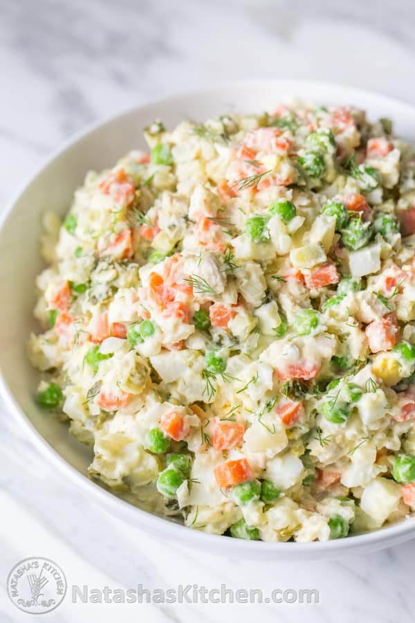 The most exciting potato salad you'll try! This chicken olivye is a favorite at church potlucks. | natashaskitchen.com 