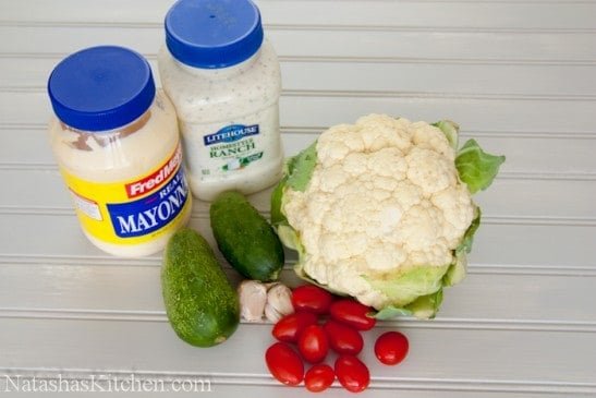 Ingredients on the table for cauliflower, cucumber and tomato salad 