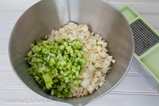 Diced cucumbers and cauliflower in a bowl 