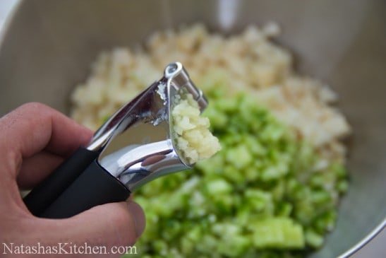 Garlic in a garlic press 