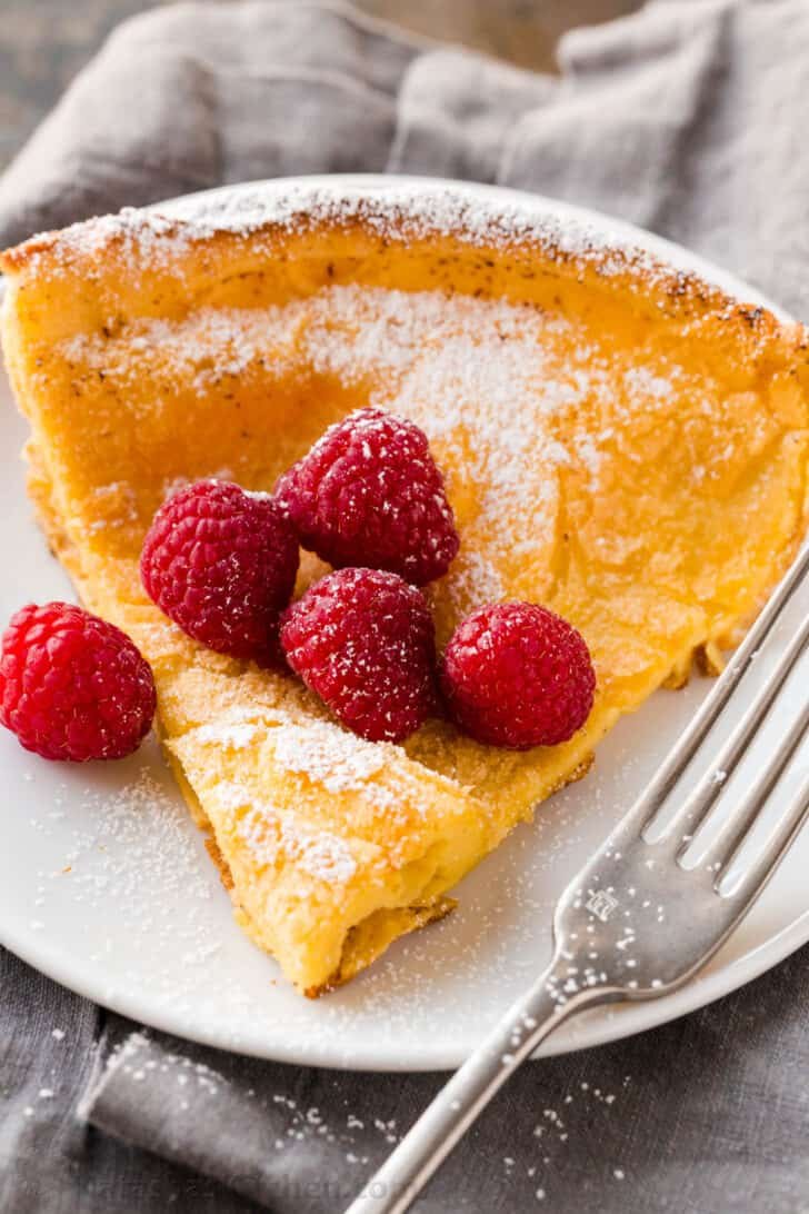 Slice of dutch baby german pancake on a plate