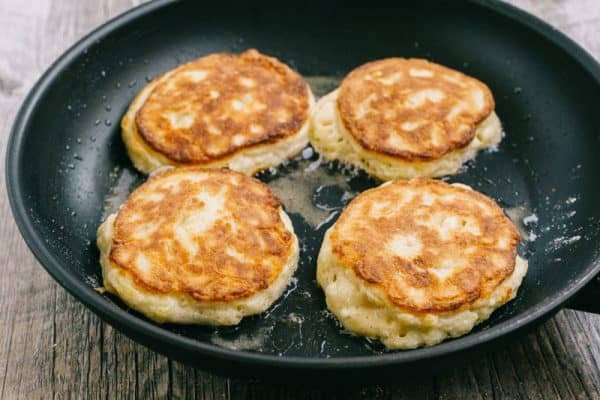 Apple and cheese pancakes are so light and fluffy. Serve these Ukrainian cheese pancakes with jam and sour cream for an unforgettable breakfast!