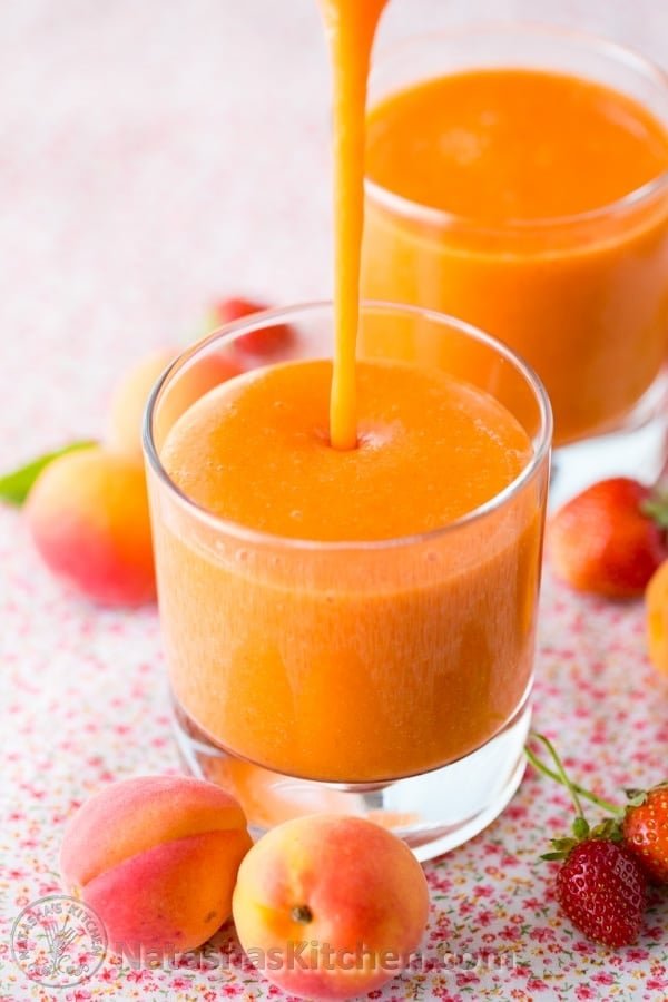 Apricot smoothies poured into cups