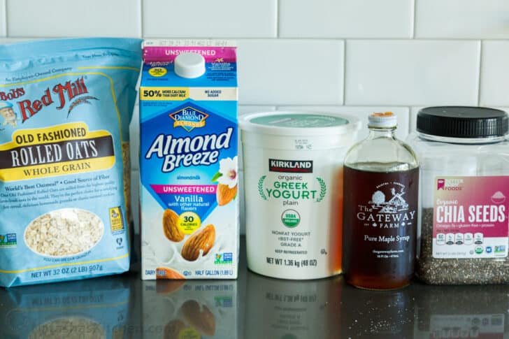 Easy and creamy Overnight Oats is the best make-ahead breakfast. No cooking required! Just stir, refrigerate and add your favorite toppings. Ingredients for making oats overnight with rolled oats, almond milk, yogurt, chia and maple syrup