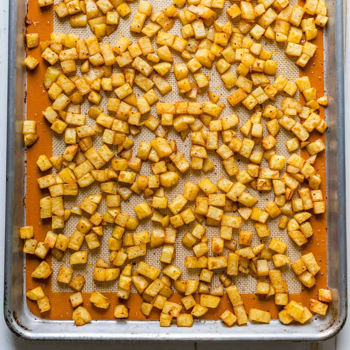Our go-to, easy breakfast potatoes recipe uses simple ingredients and the best cooking method for potatoes, so each bite is delicious! Silpat mat with breakfast potato hash