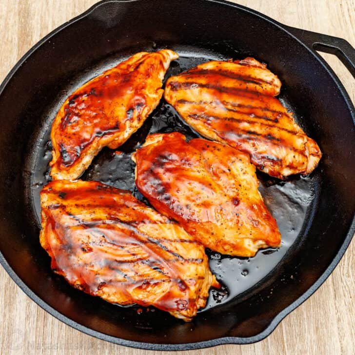 Our Chili's copycat Monterey Chicken recipe brings the grilled chicken, tangy BBQ, smoky bacon, and gooey cheese restaurant favorite home to your kitchen. Grilled chicken covered in sweet bbq sauce in a skillet