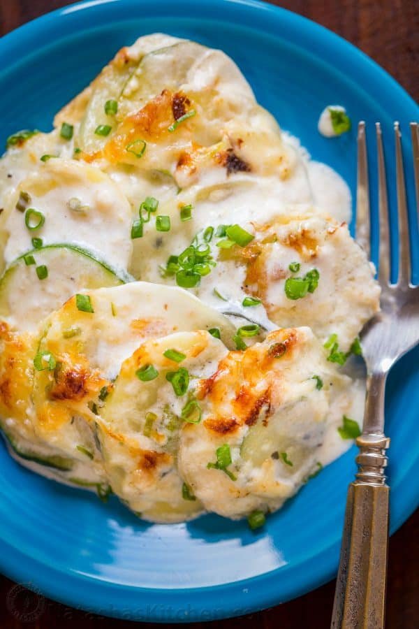 Creamy, cheesy Zucchini Potato Bake in a garlic Alfredo sauce. This potato bake recipe has simple ingredients, comes together quickly and tastes so good! | natashaskitchen.com
