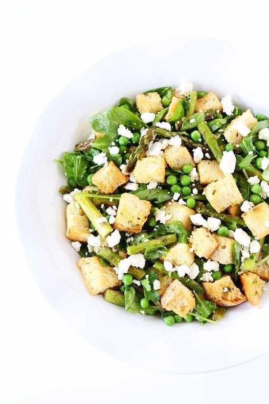 Spring Panzanella Salad Recipe on twopeasandtheirpod.com I love all of the spring veggies in this panzanella salad! So pretty and tasty! Spring Panzanella Salad Recipe on twopeasandtheirpod.com