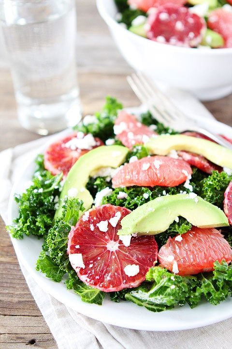 Healthy Kale Salad Recipe Healthy Kale Salad Recipe with Citrus, Avocado, and Feta on twopeasandtheirpod.com