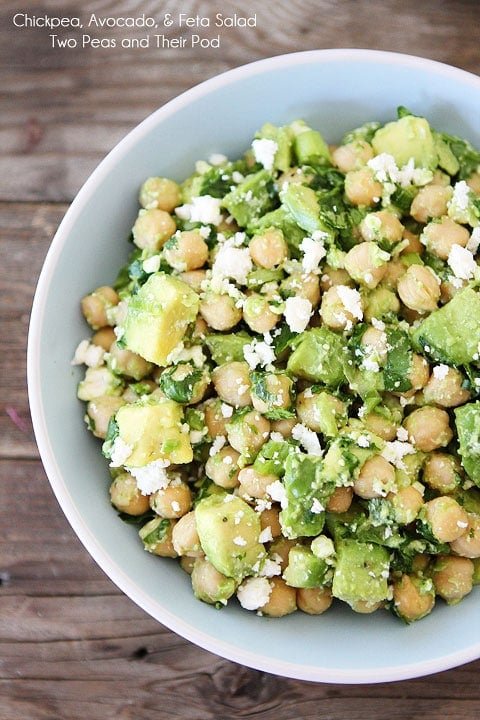 Easy Chickpea, Avocado, & Feta Salad Recipe on twopeasandtheirpod.com Make this healthy salad in 5 minutes! Easy Chickpea, Avocado, & Feta Salad Recipe in serving bowl.