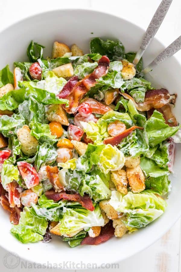 A BLT Salad loaded with fresh lettuce, crispy bacon, bright tomatoes, crunchy croutons and the BLT Salad dressing is exceptional. Easy, excellent salad! | natashaskitchen.com