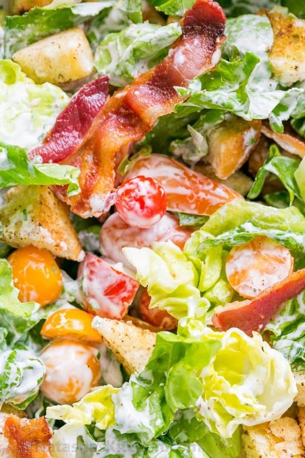 A BLT Salad loaded with fresh lettuce, crispy bacon, bright tomatoes, crunchy croutons and the BLT Salad dressing is exceptional. Easy, excellent salad! | natashaskitchen.com