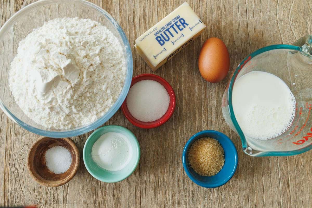 Ingredients to make classic scones Ingredients to make classic scones: flour, sugar, egg, butter, baking powder, salt, heavy whipping cream