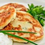 This Easy Mashed Potato Pancakes Recipe works for breakfast, lunch or dinner and it's a perfect use for left over mashed potatoes. Serve with sour cream.