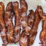 crispy bacon strips on a paper towel