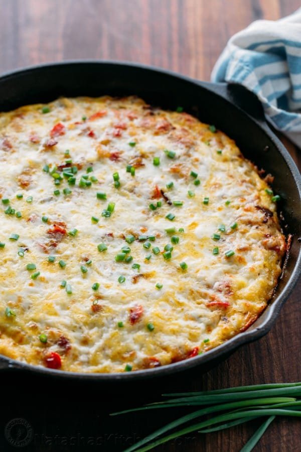This breakfast casserole goes from stove to oven in one pan. Under the gooey cheesy crust, it's loaded with bacon, hash browns and of course, more cheese!