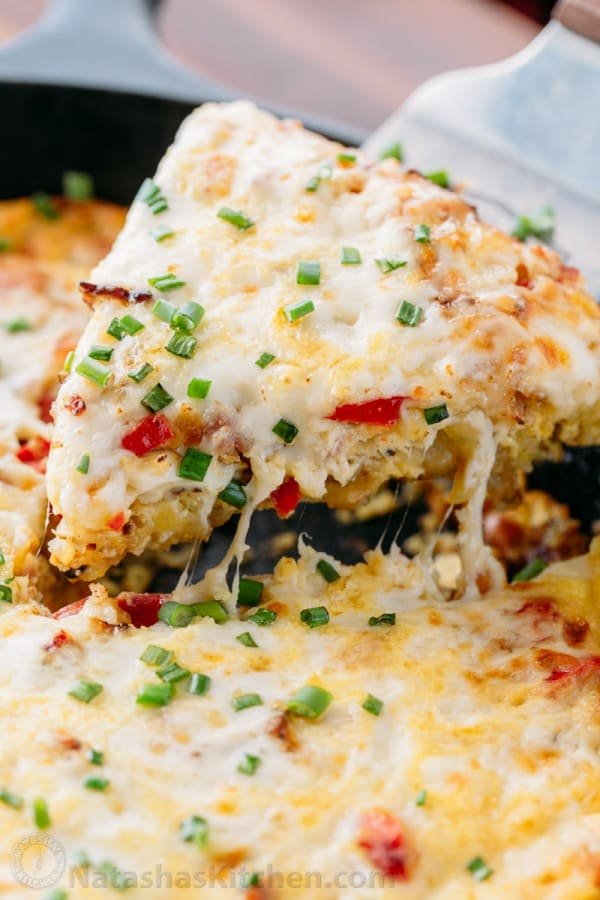 This breakfast casserole goes from stove to oven in one pan. Under the gooey cheesy crust, it's loaded with bacon, hash browns and of course, more cheese!