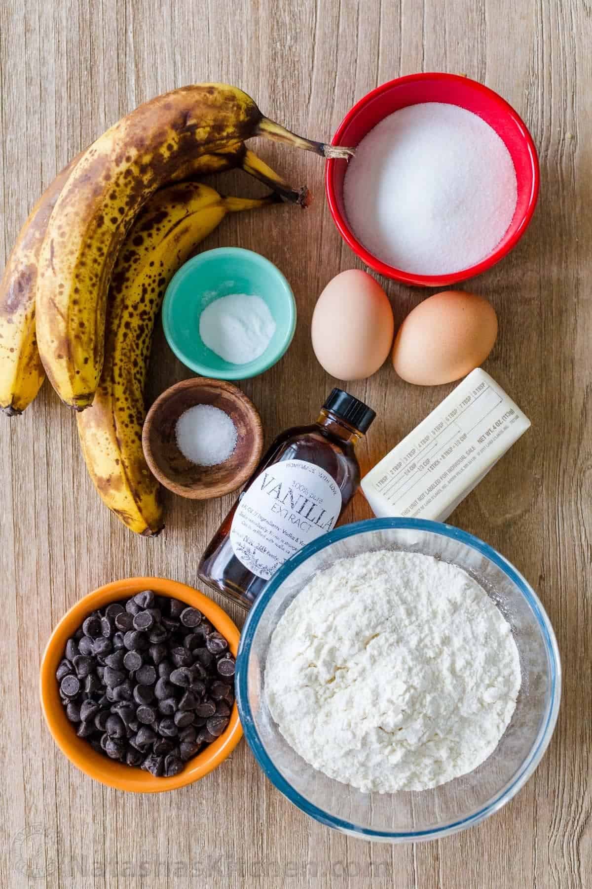Easy Banana Muffins with chocolate chips are the ultimate treat. Our best banana chocolate chip muffins are a great way to use ripe bananas! Ingredients for quick bread cake with overripe fruit, sugar, salt, eggs, baking soda, butter, flour, and chocolate chips
