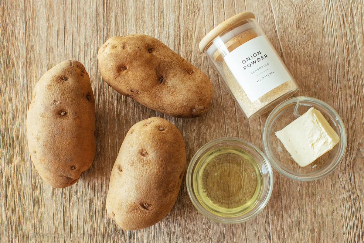 What you will to make breakfast potato hash Ingredients for homemade hash brown recipe with russet potatoes, onion powder, butter and oil
