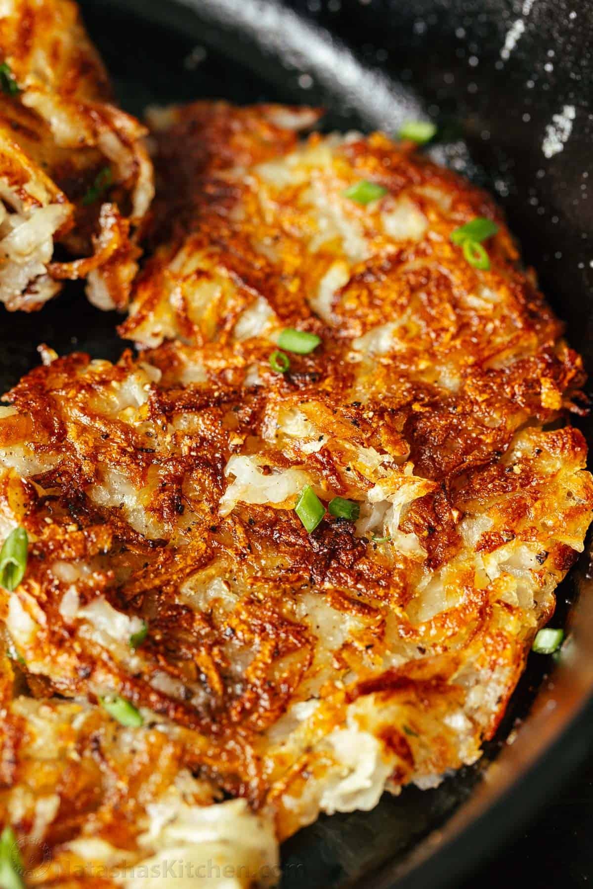 Here’s the secret to making the best Crispy Hash Browns - the perfect breakfast side dish. A classic homemade Hash Brown Recipe. Up close golden crispy hash browns