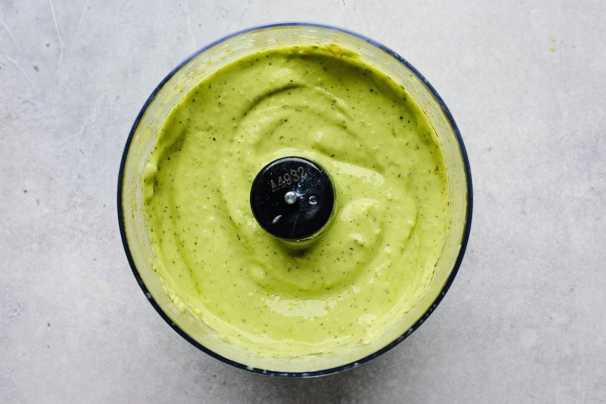 creamy avocado dressing in food processor.