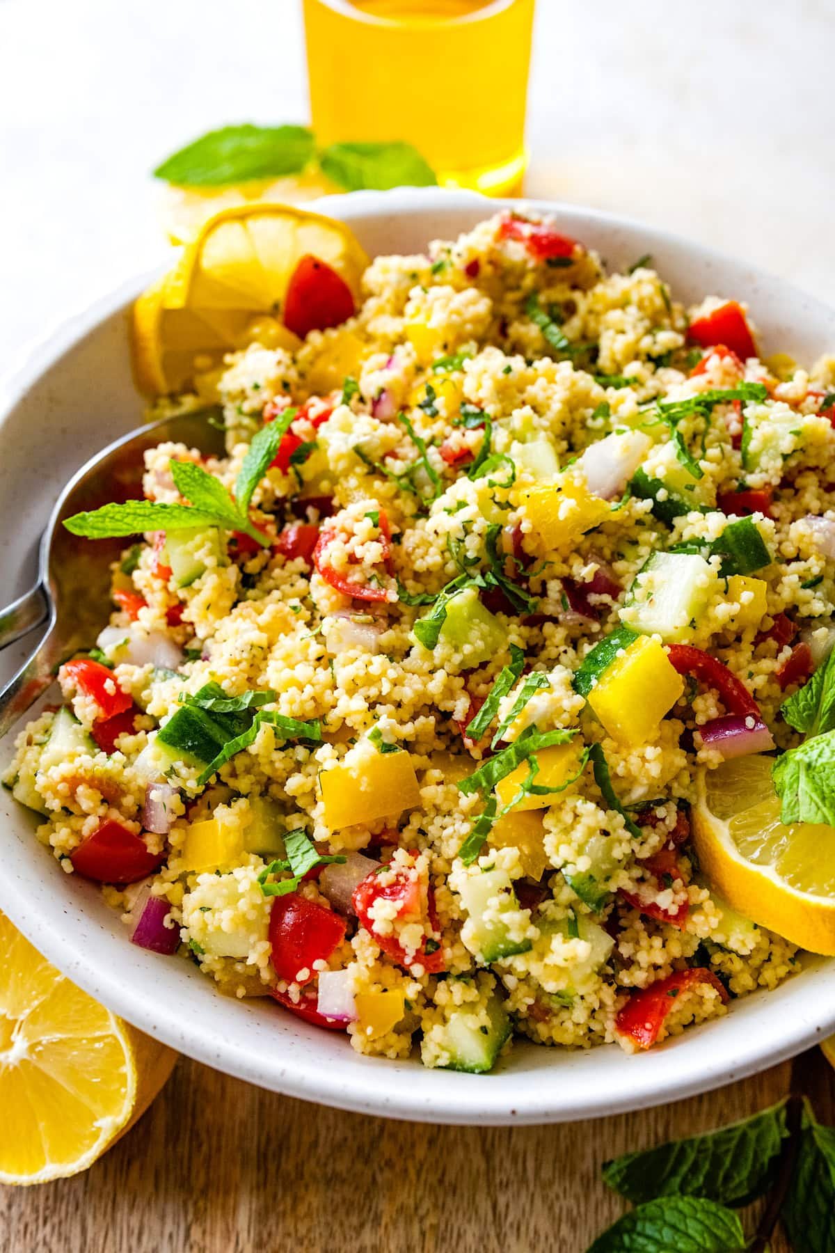 couscous salad in mixing bowl.