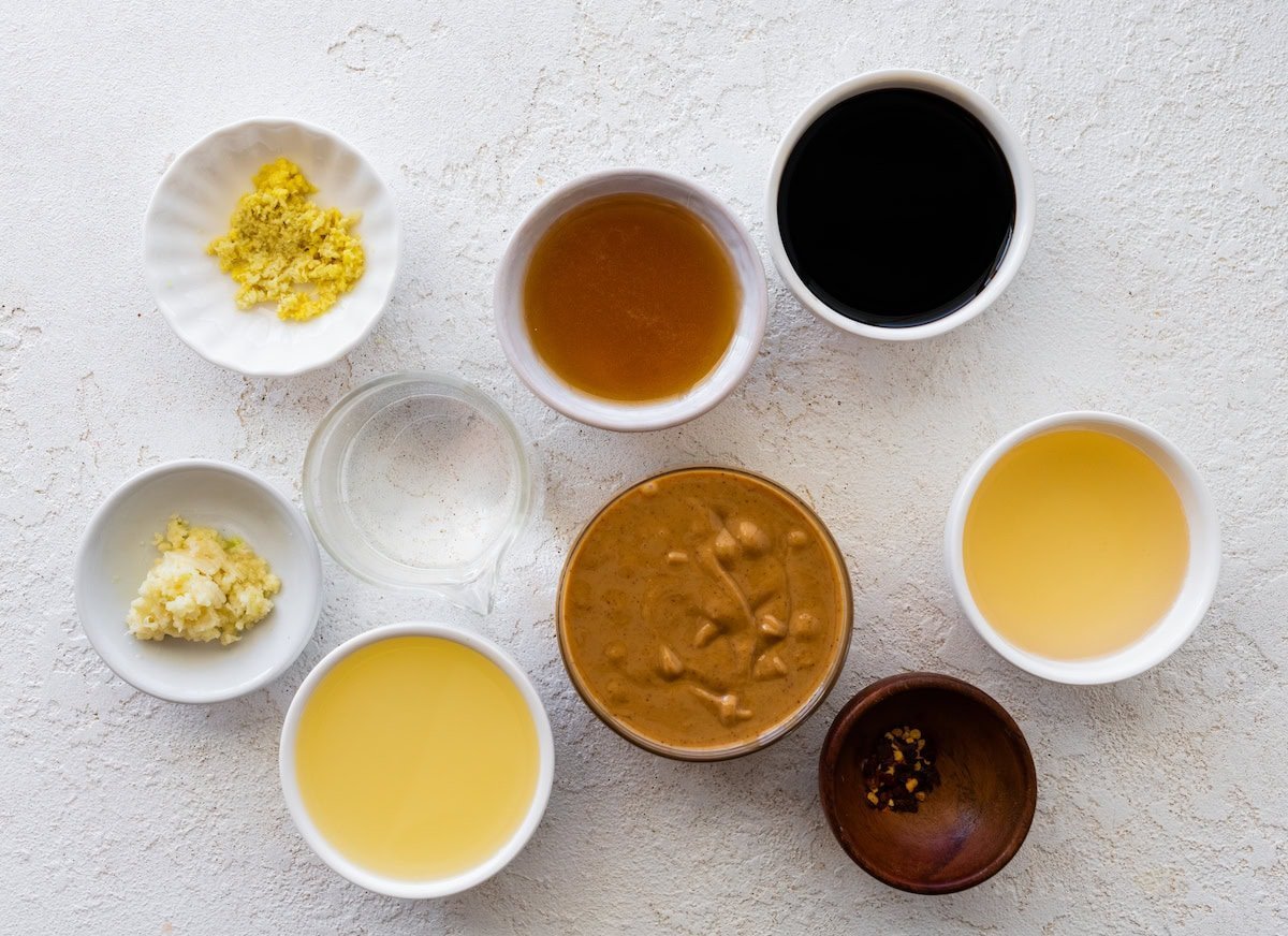 peanut dressing ingredients in bowls/